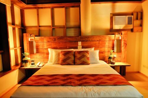 Ein Bett oder Betten in einem Zimmer der Unterkunft Boffo Resort