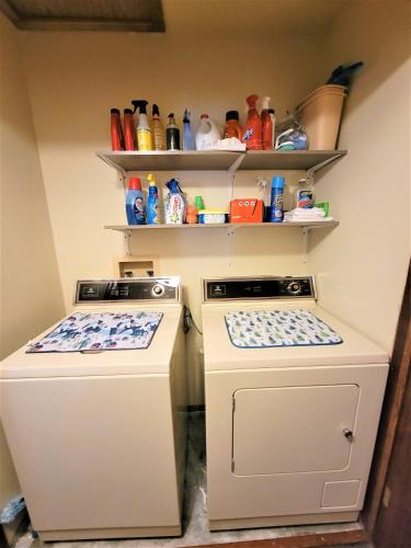 two washing machines sitting next to each other in a kitchen at Four Seasons Getaway-Private Hot Spa with Pine Tree Views-Walk to Village and Pineknot Trailhead-Plus King Bed! in Big Bear Lake