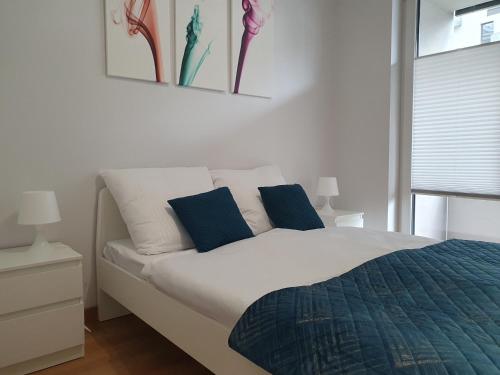 Ένα ή περισσότερα κρεβάτια σε δωμάτιο στο Apartament 45