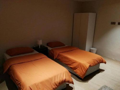 Postel nebo postele na pokoji v ubytování Aljabal alakhdar vecation home