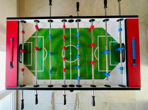 a painting of a soccer field with baseball bats at Ritorno alla Natura in Recanati