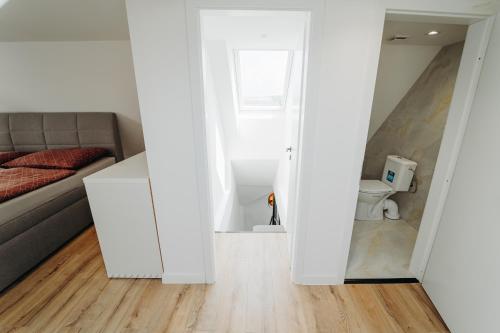 Postel nebo postele na pokoji v ubytování ALAVIA Residence