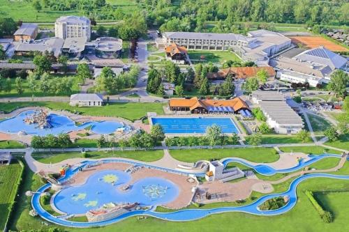 an aerial view of the water park at the resort at Cosy Hill Home Rucman With a Breathtaking View in Zgornja Pohanca