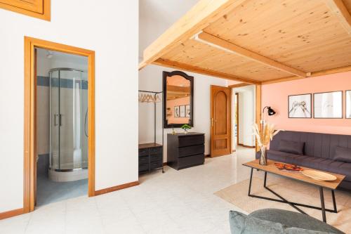 a living room with a couch and a table at Imperial Nazionale in Rome