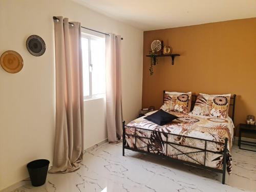 Postel nebo postele na pokoji v ubytování Deluxe B&B "Casa Alegria", Tarrafal