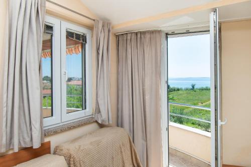 Posteľ alebo postele v izbe v ubytovaní Apartments Stefa