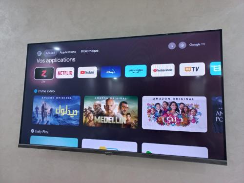TV a/nebo společenská místnost v ubytování Rawan Appart
