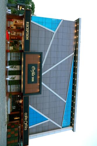 a rendering of the front of a building at ORFILA INN Airport Hotel in Angamali