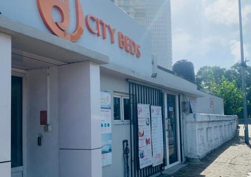 a jeryeyes sign on the side of a building at City Beds Colombo in Colombo