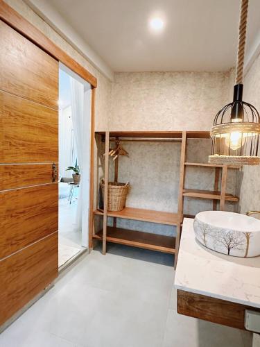 a bedroom with a bunk bed and a door at Crystal 7 in Haad Tian