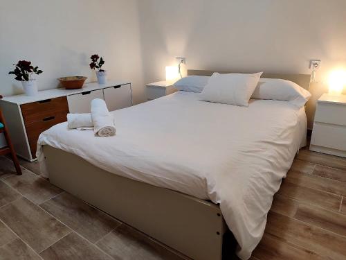 Postel nebo postele na pokoji v ubytování Angy Home Chueca Gran Via
