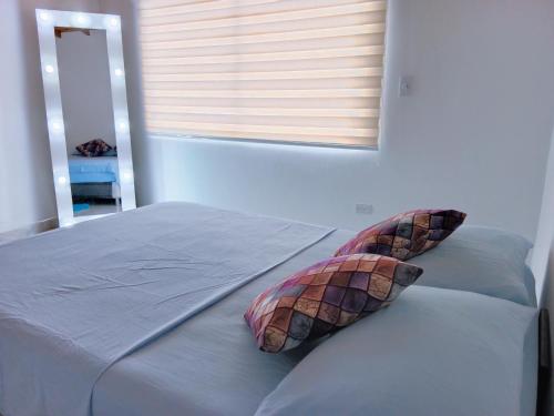 Hermosa y amplia habitación - Baño privado tesisinde bir odada yatak veya yataklar