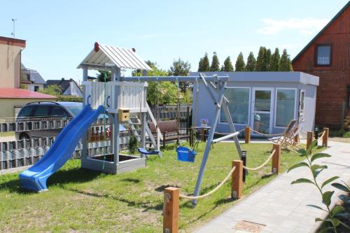 Ο χώρος παιχνιδιού για παιδιά στο Domki Morskie