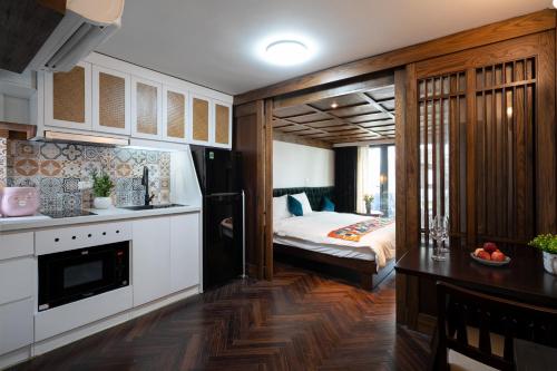 Kuchyň nebo kuchyňský kout v ubytování Fusion Links Apartments