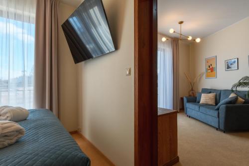TV a/nebo společenská místnost v ubytování Hotel Szlak Bursztynowy