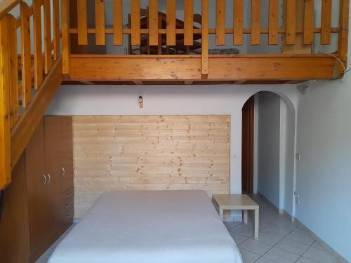 Un pat sau paturi într-o cameră la Il Nido
