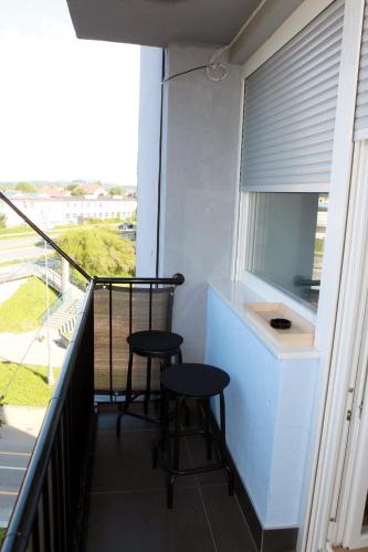 Balkón nebo terasa v ubytování D&K Apartman