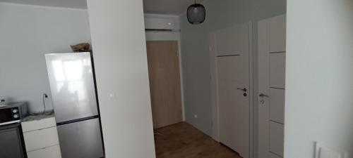 TV a/nebo společenská místnost v ubytování Błękitne zacisze