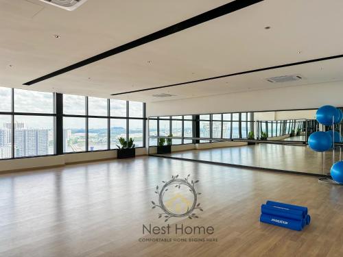 a bowling alley with a nest home logo on the floor at Twin Tower Residence by Nest Home【5 mins walk to CIQ】 in Johor Bahru