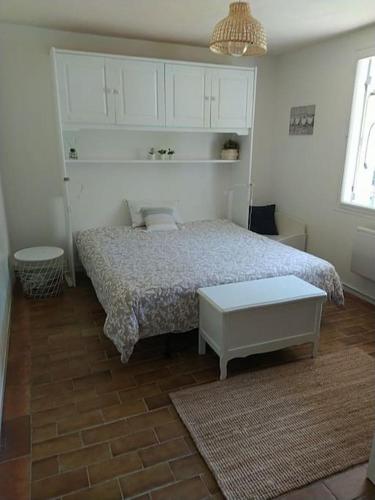 Кровать или кровати в номере L'abri côtier