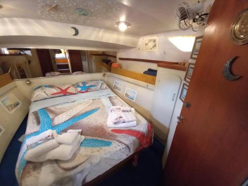 Postel nebo postele na pokoji v ubytování Barca Deliziosa