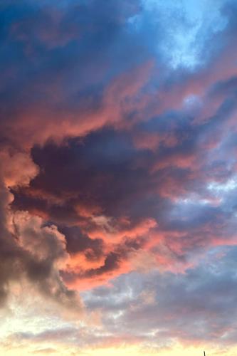 a cloudy sky at sunset with at Foss Lodge - luxe boutique boshuis Veluwe in Nunspeet