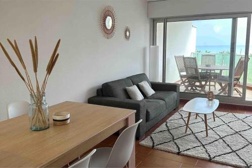 Ruang duduk di Appartement 4-5 pers vue mer
