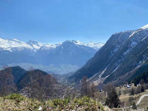 a view of a mountain valley with snow covered mountains at Residenz Panorama - Blatten bei Naters VS in Blatten bei Naters
