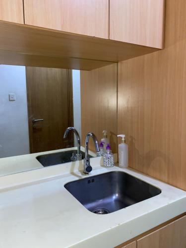 Køkken eller tekøkken på RoomQu at Apartment Tree Park