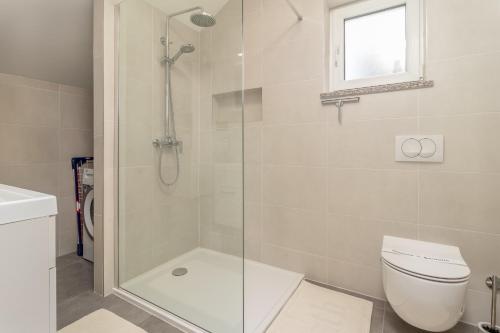 Koupelna v ubytování Aura Apartment
