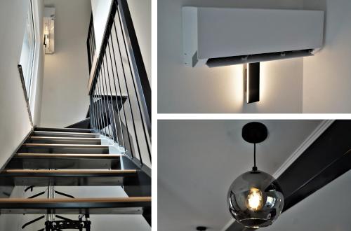 a staircase with a pendant light and a stair case at ARIA DELUXE Mobile Homes with Terme Čatež Tickets in Čatež ob Savi