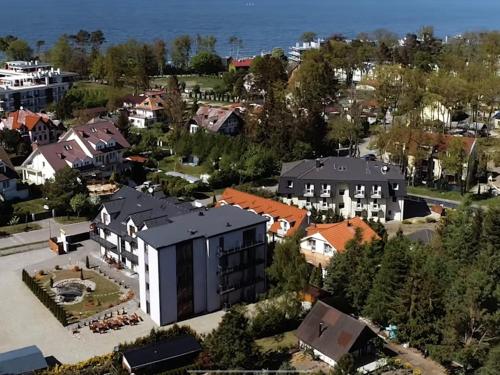 an aerial view of a town with houses at Baltic Sun SPA in Rewal