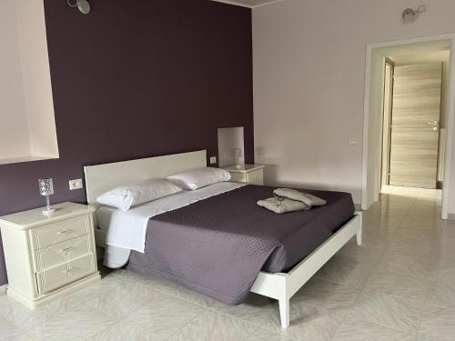 Ένα ή περισσότερα κρεβάτια σε δωμάτιο στο B&B Il Borgo
