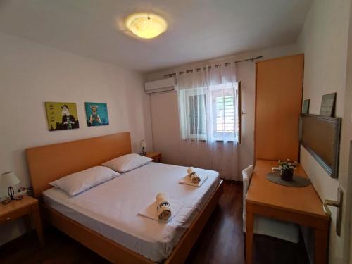 Postel nebo postele na pokoji v ubytování Kaleta