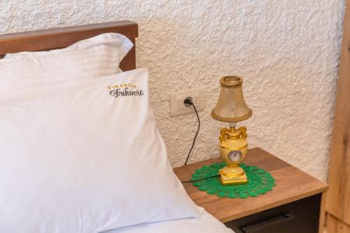 Apartments and Winery Djukovicにあるベッド