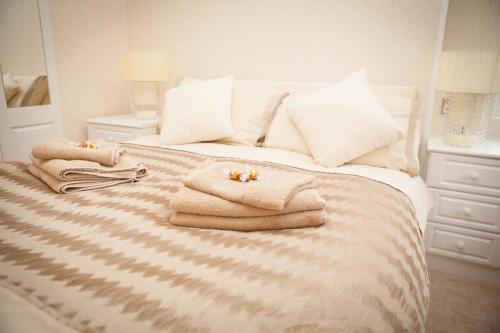 Llit o llits en una habitació de Strathearn Lodge