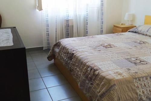 Säng eller sängar i ett rum på Casa Savia, vacanze lago d'Iseo