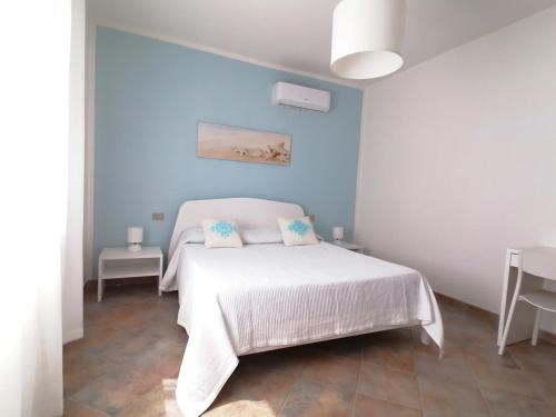 Ένα ή περισσότερα κρεβάτια σε δωμάτιο στο Marea Apartment