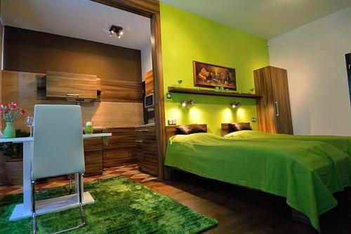 A bed or beds in a room at Angel's Apartment