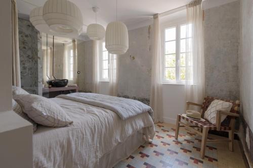 Tempat tidur dalam kamar di De Vert et d'O