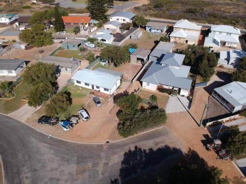 an aerial view of a small town with houses at dhu drop inn in Cervantes