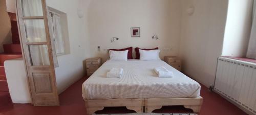 Postel nebo postele na pokoji v ubytování Villa Kisiris