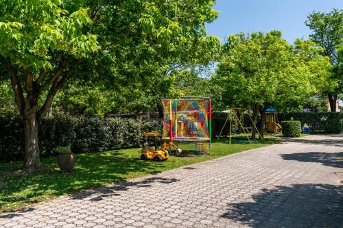 a park with a playground and a play equipment at La Conchiglia in Chioggia