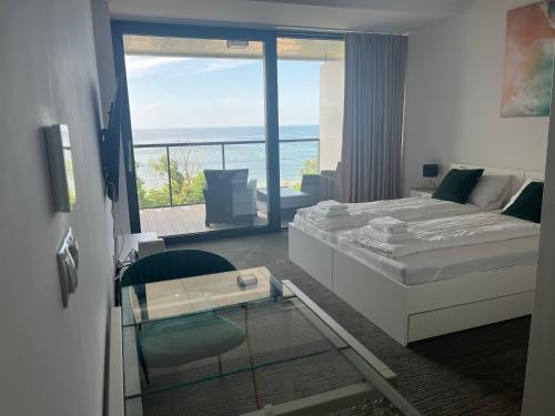 Ένα ή περισσότερα κρεβάτια σε δωμάτιο στο Apartament z widokiem