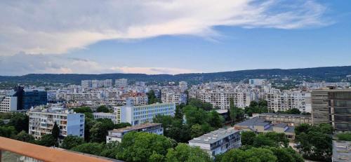 a view of a city with buildings and trees at Студио Тони 2 in Varna City