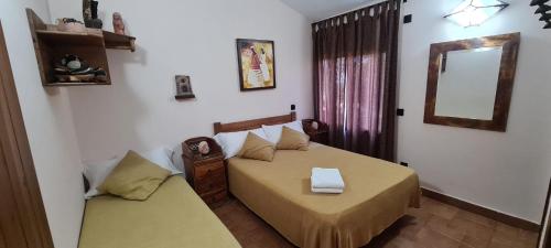 Postel nebo postele na pokoji v ubytování Casa Vargas