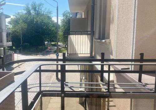 a balcony of a building with a railing at Żeromskiego Residence in Słupsk