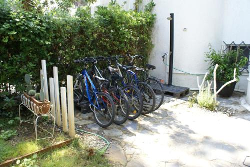 a group of bikes parked next to a building at DomusAuroom, il tuo RELAX in Viareggio