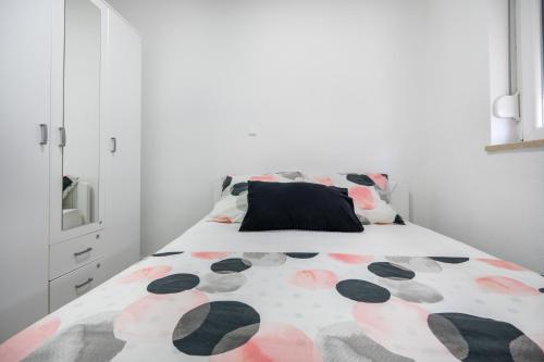 Postel nebo postele na pokoji v ubytování Apartmani Neuense