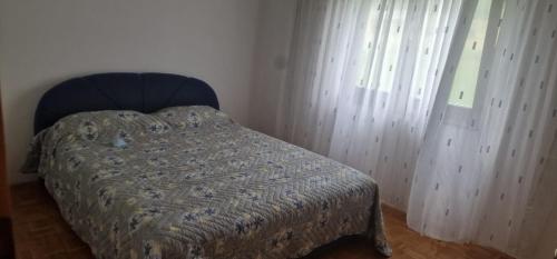 Postel nebo postele na pokoji v ubytování Villa Janković